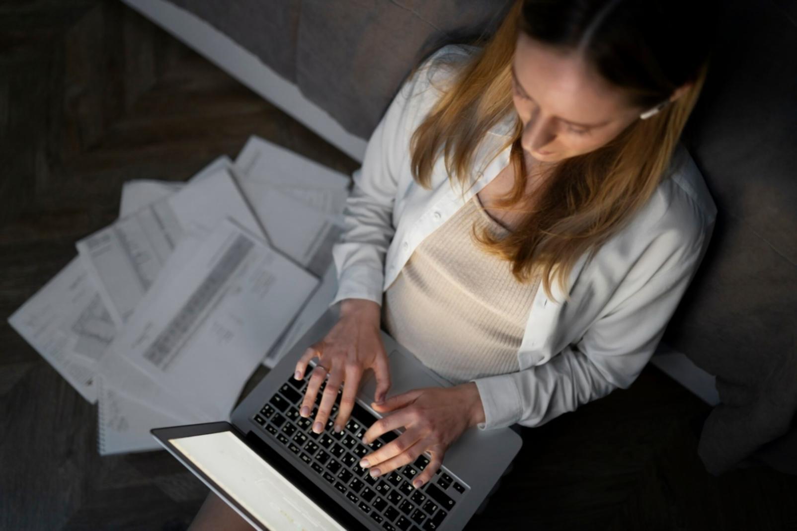 Financial planning workspace with documents and charts